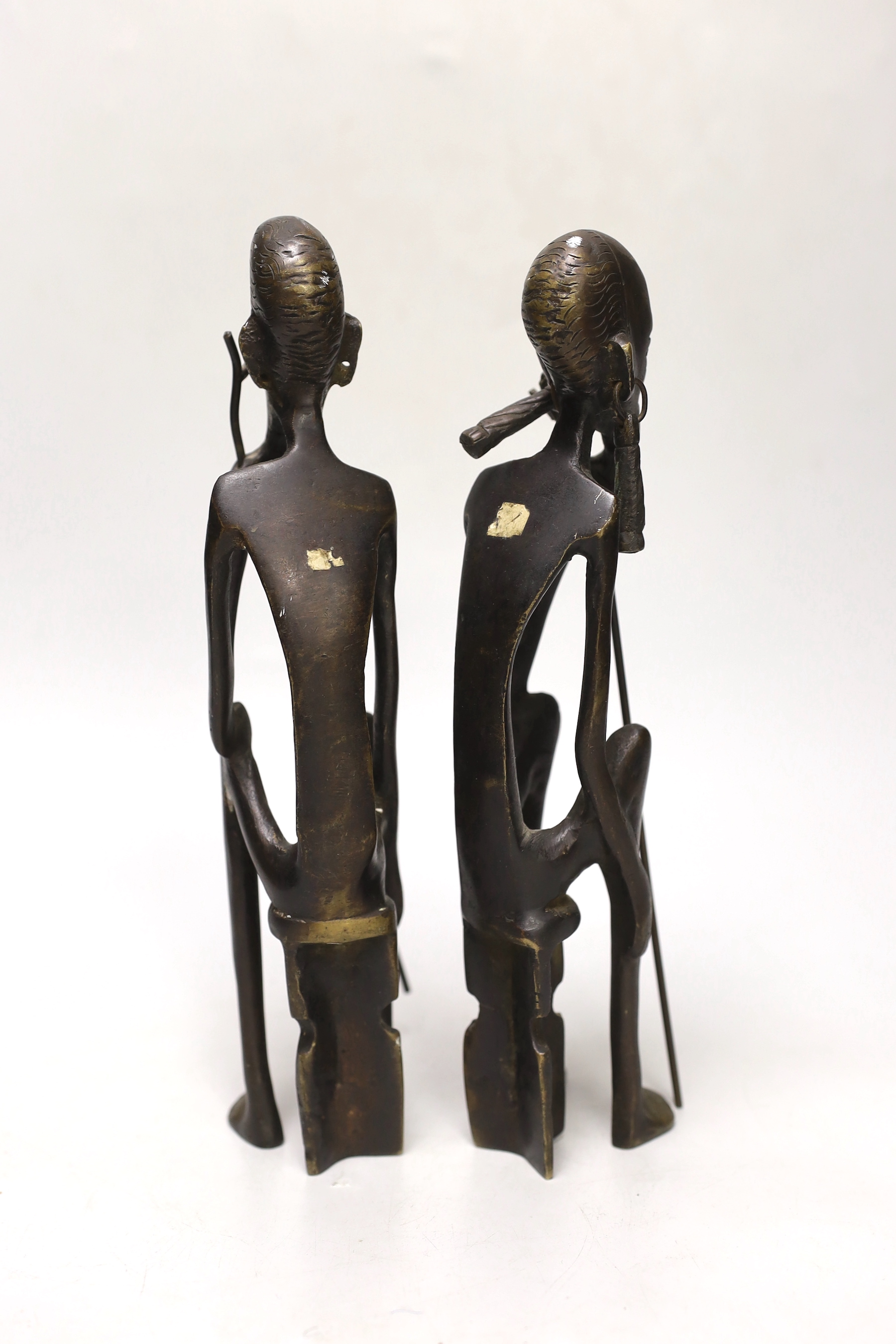 A pair of African figural bronzes, 27cm high